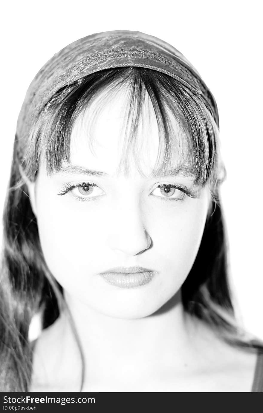 A young woman posing in the studio.