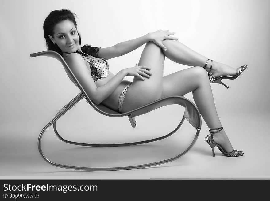 Beautiful girl on a chair