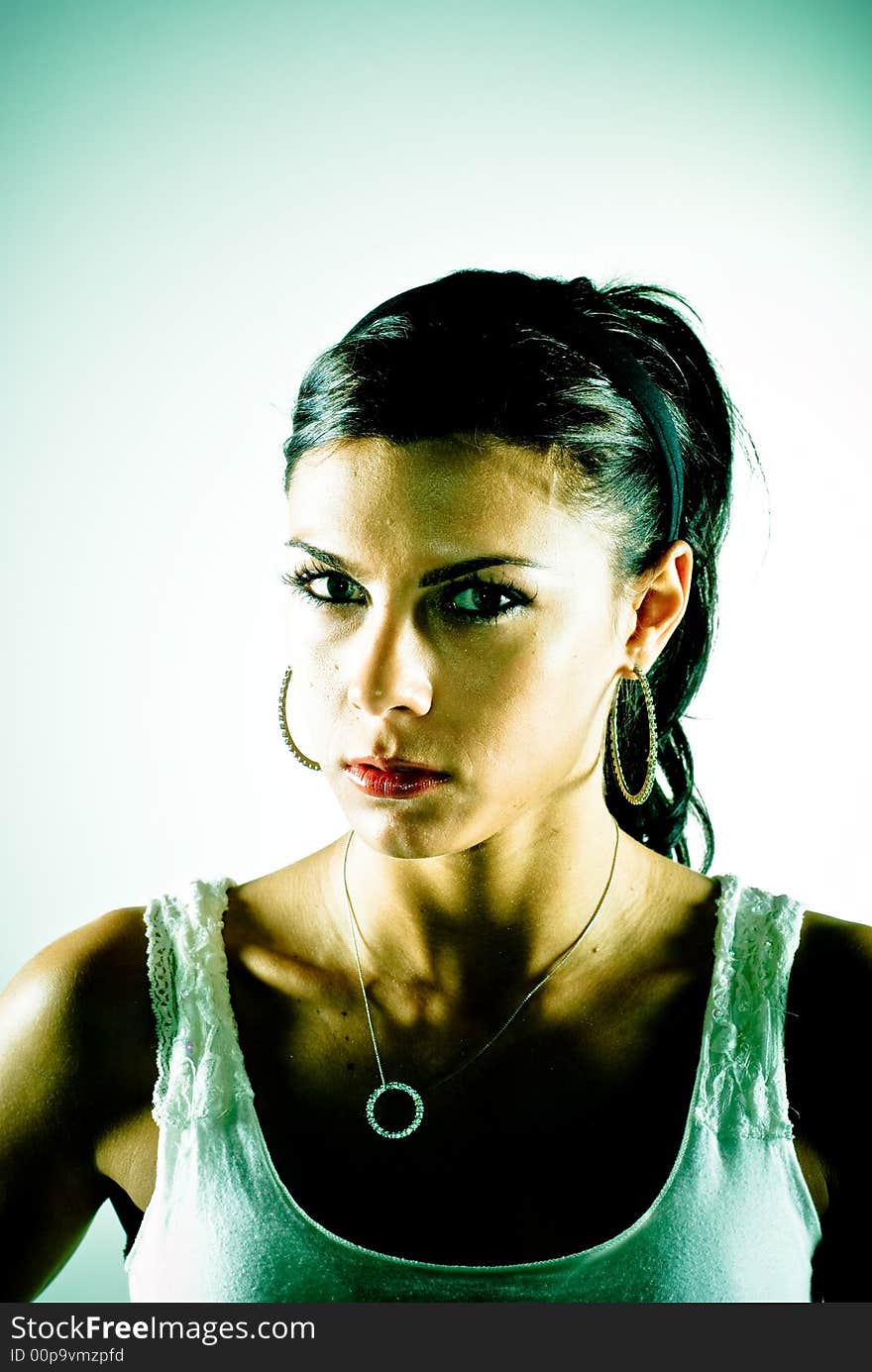 A young woman posing in the studio.