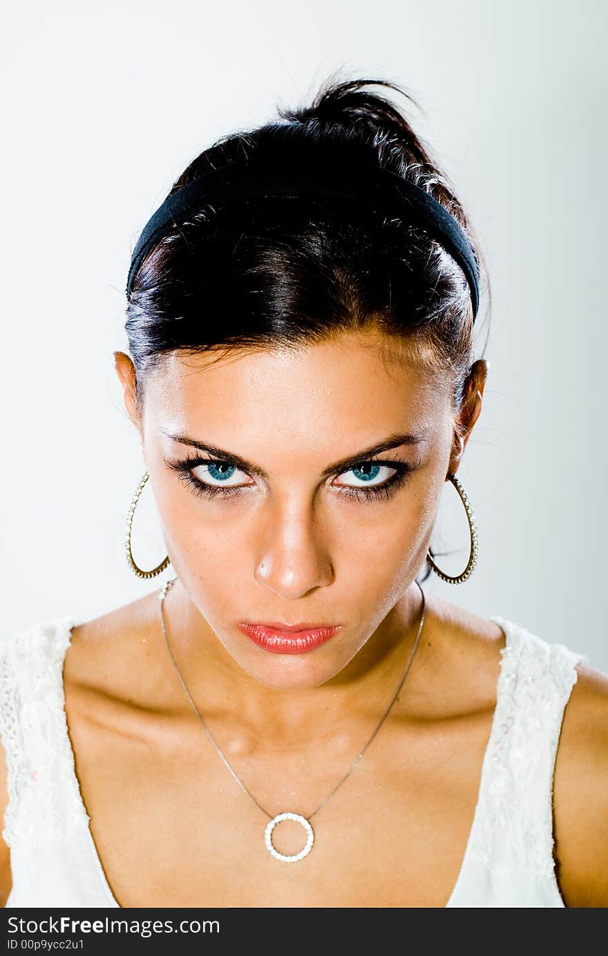 A young woman posing in the studio.