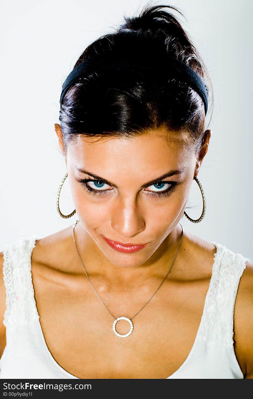 A young woman posing in the studio.