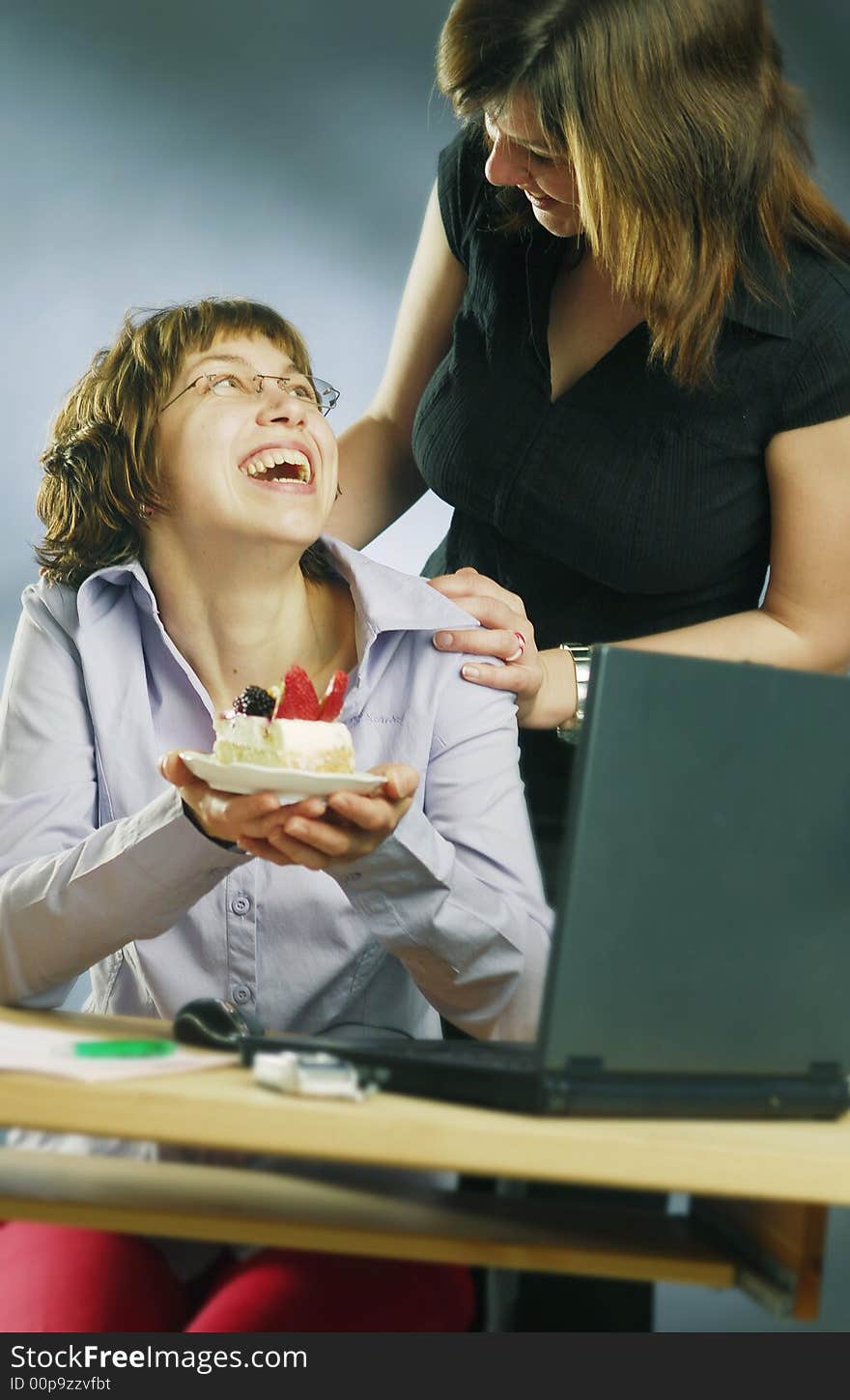 Smiling colleagues in an office. Smiling colleagues in an office