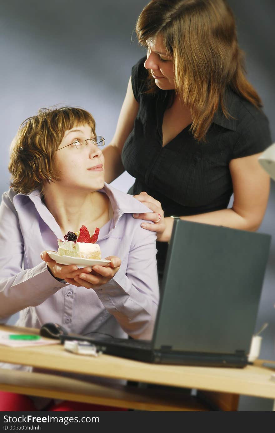 Portrait of misses with a cake