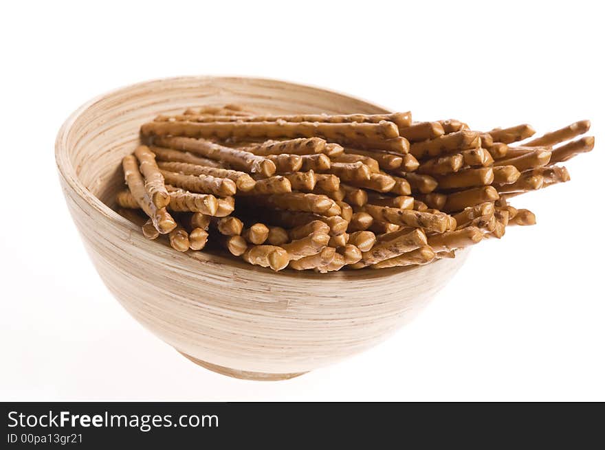 Bowl of snacks isolated on the white backgound