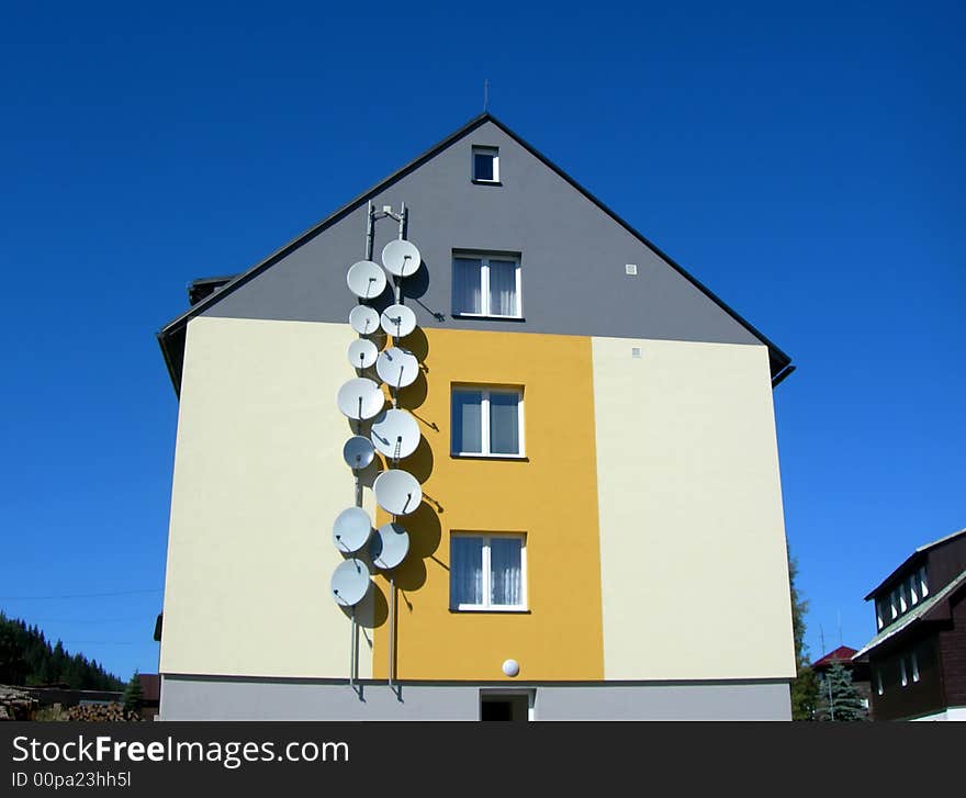 House With Satellite Recievers