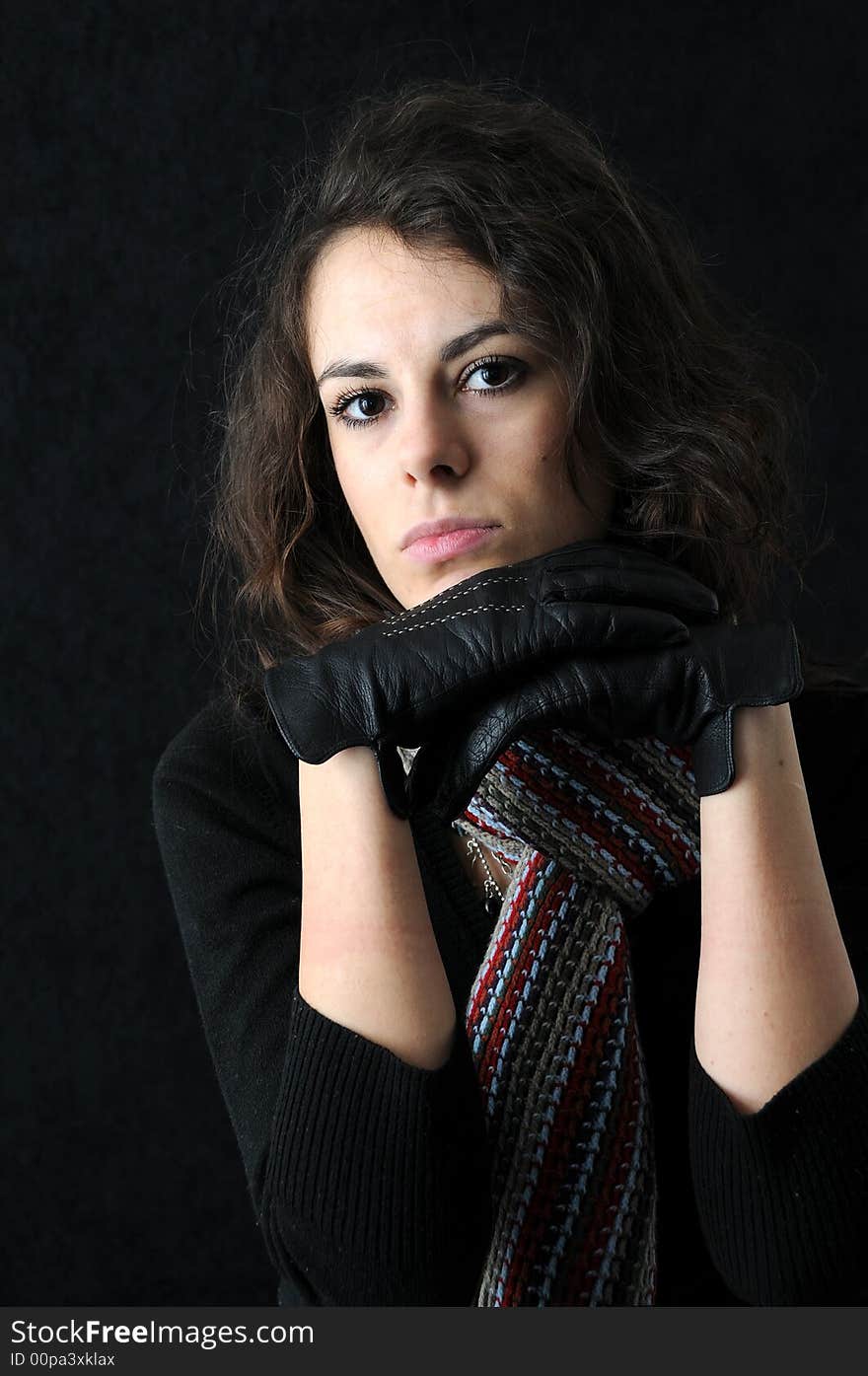 Beautiful brunette on black background