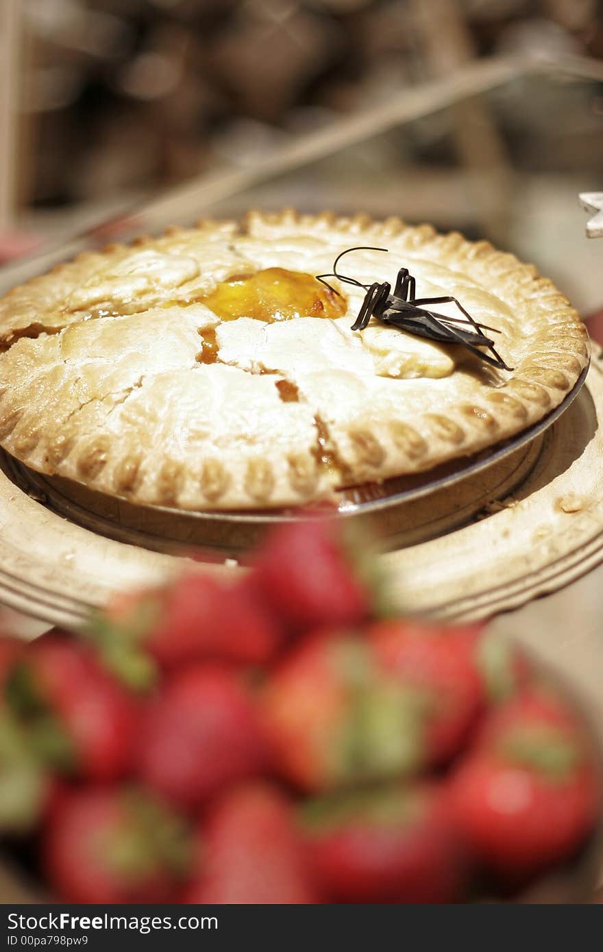 Freshly peach pie and fresh fruit at a buffet