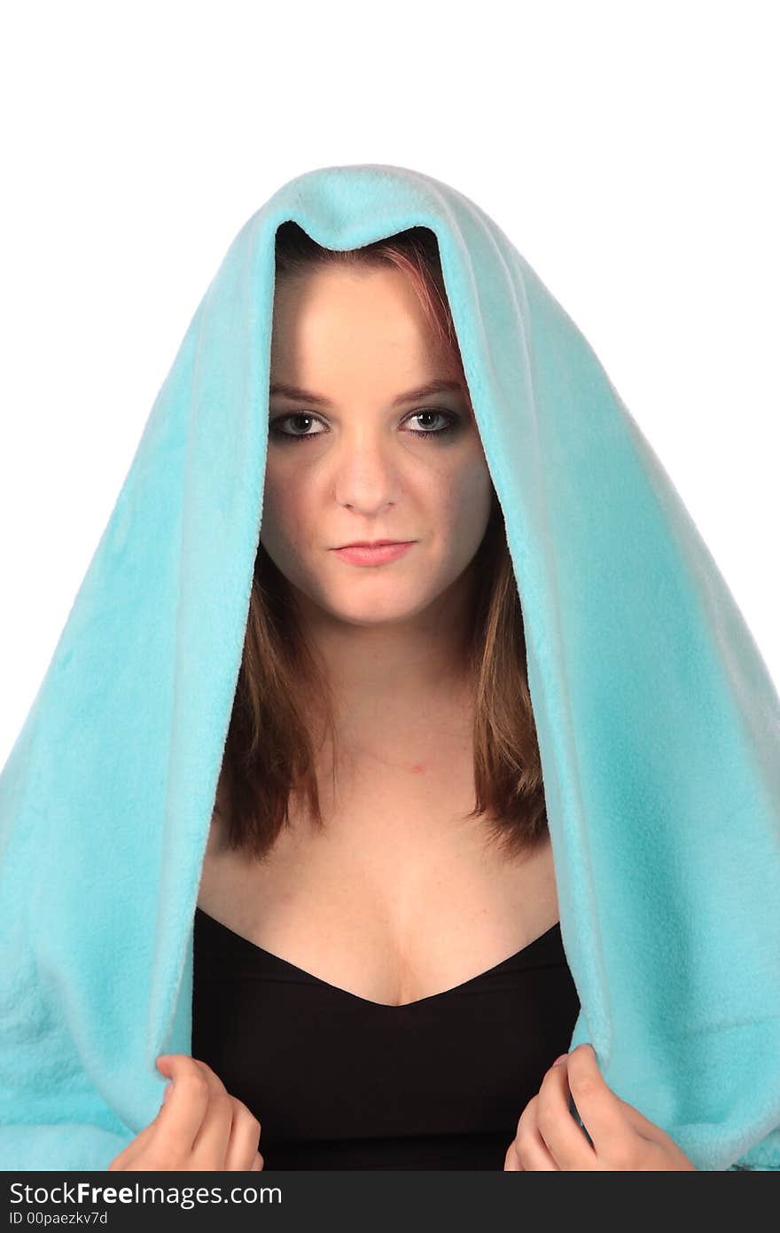 Model with blue blanket pulled over head