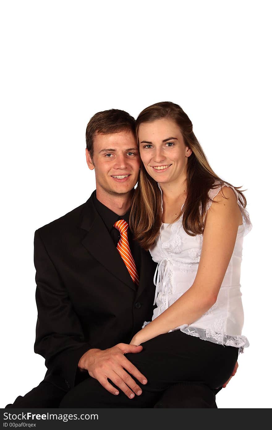 Young lady sitting on her partner's lap. Young lady sitting on her partner's lap