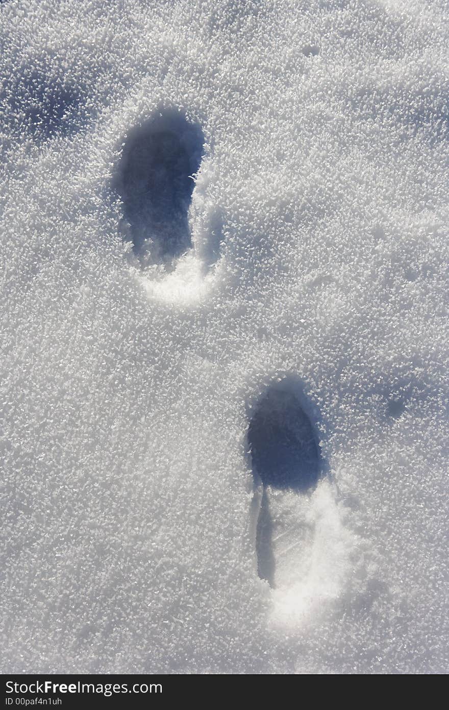 Two Tracks in snow, ice crystals visible