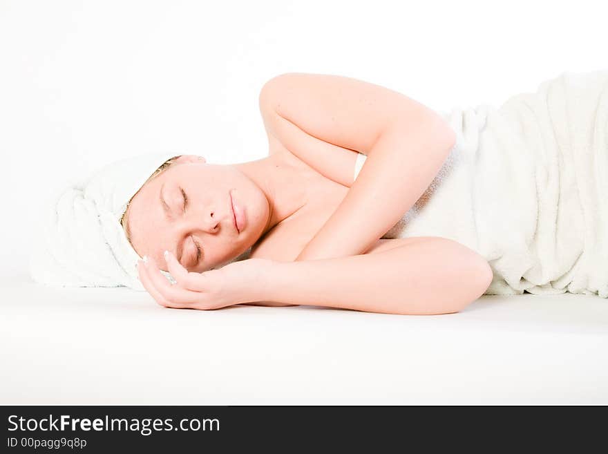 Studio portrait of a spa girl sleeping. Studio portrait of a spa girl sleeping