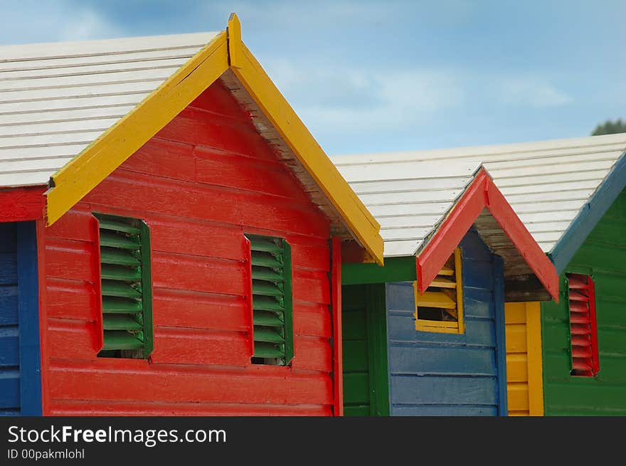 Famous changing huts for bathers on the beach at Muizenberg. Famous changing huts for bathers on the beach at Muizenberg.