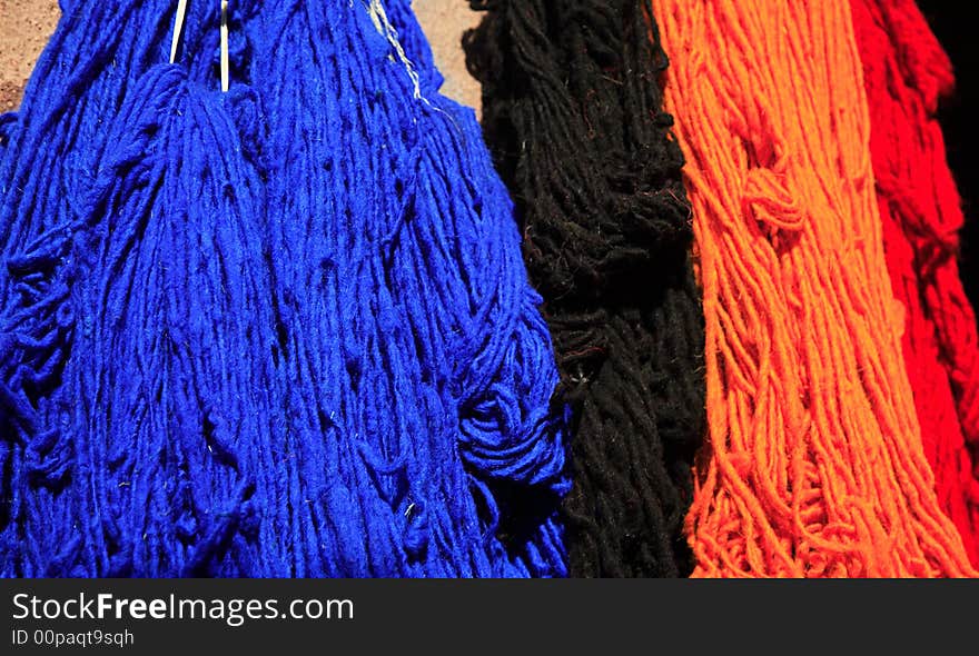 Coloured wool drying in the sun Marrakech Morocco