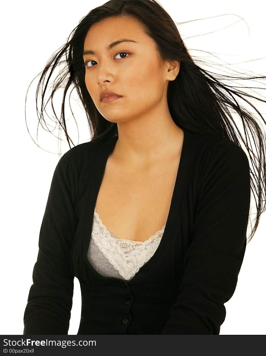 Beauty portrait of asian girl with fly away hair. Beauty portrait of asian girl with fly away hair