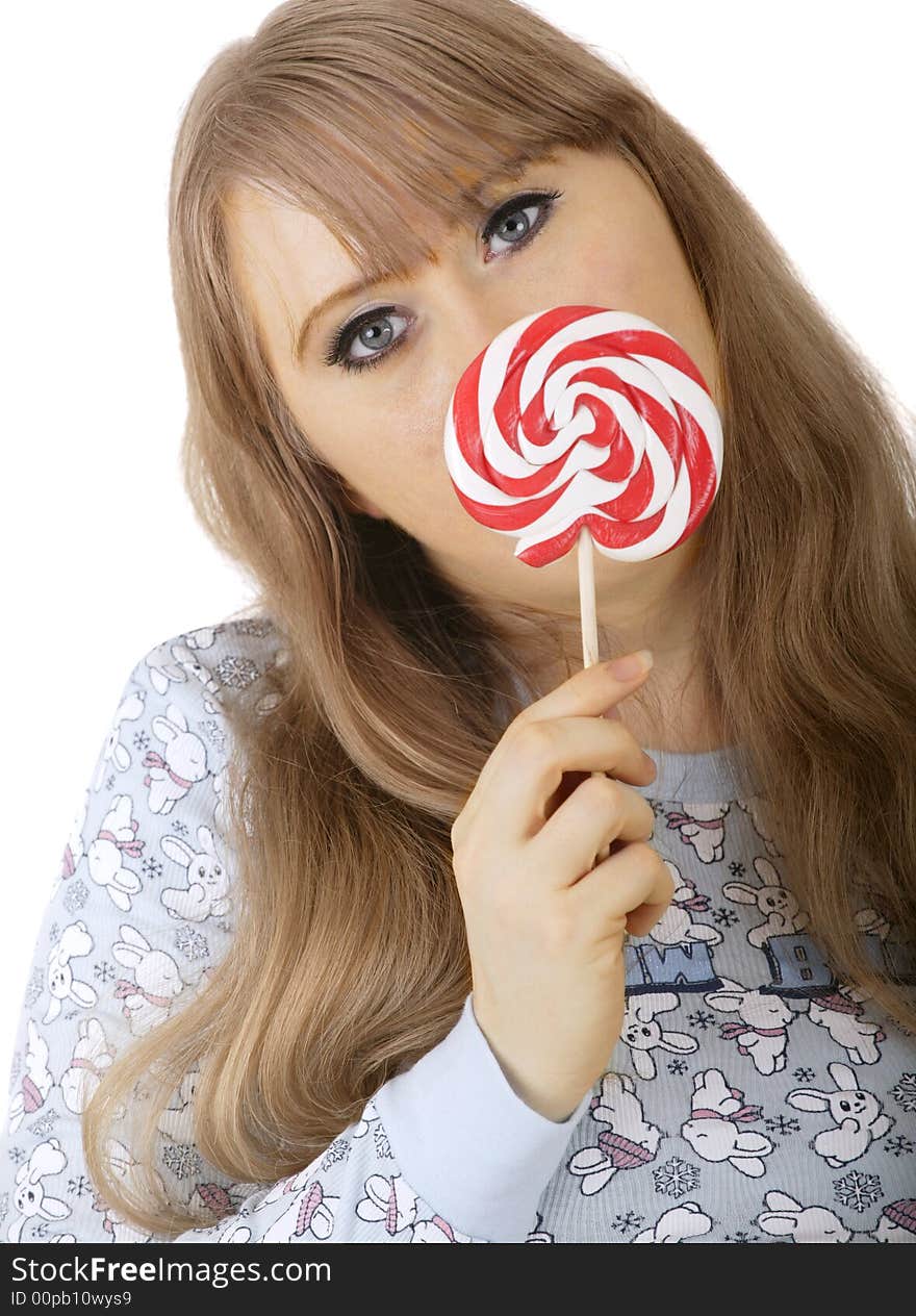 Bunny girl with bunny shirt holding up lollipop candy. Bunny girl with bunny shirt holding up lollipop candy