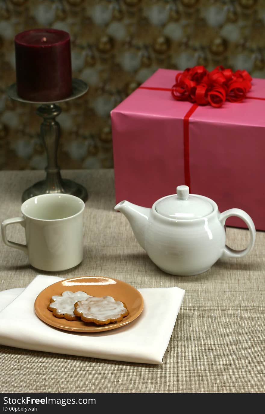 A party table set with cookies and tea