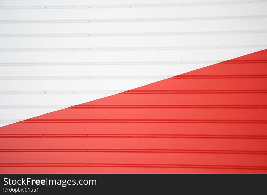 Abstract detail of the colorful exterior of a metal sided sports building. Abstract detail of the colorful exterior of a metal sided sports building