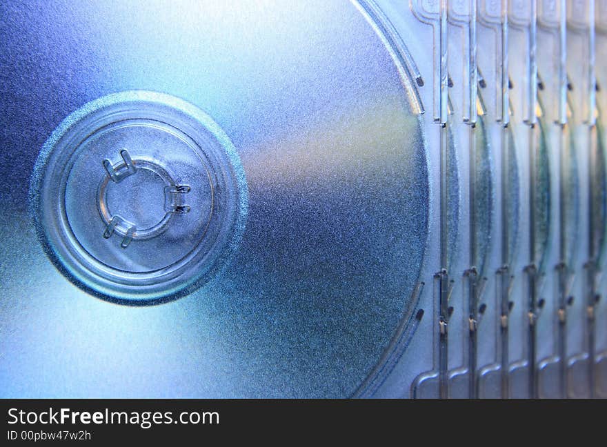 Close up abstract of a pile of fanned out compact discs. Close up abstract of a pile of fanned out compact discs