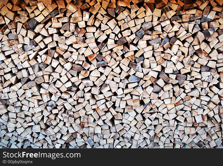 A background of firewood in pile