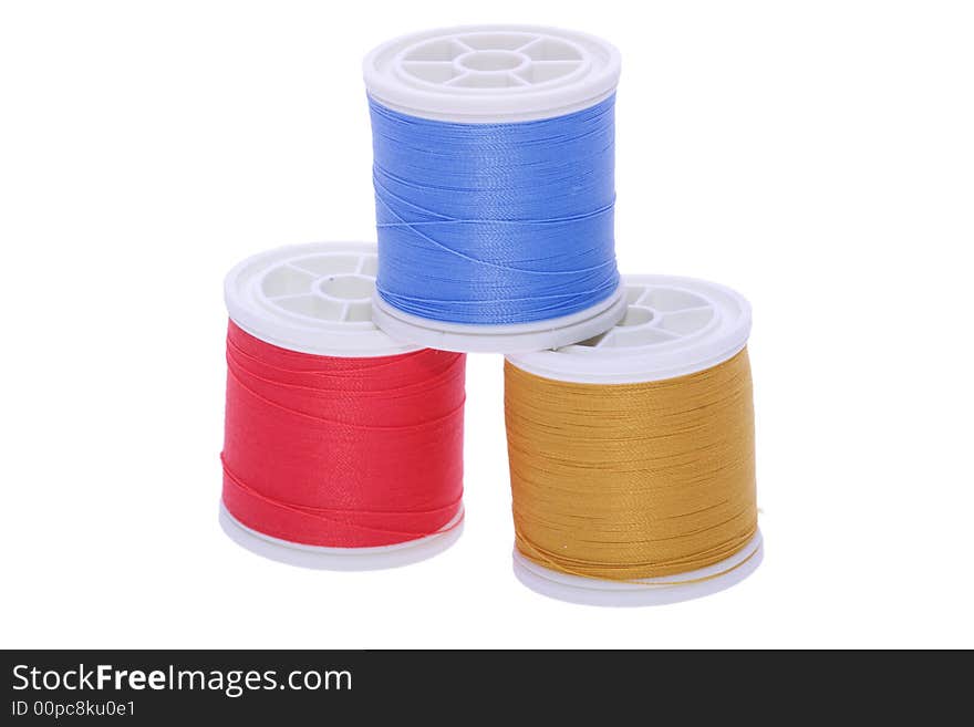 Thread reels isolated on white. Thread reels isolated on white