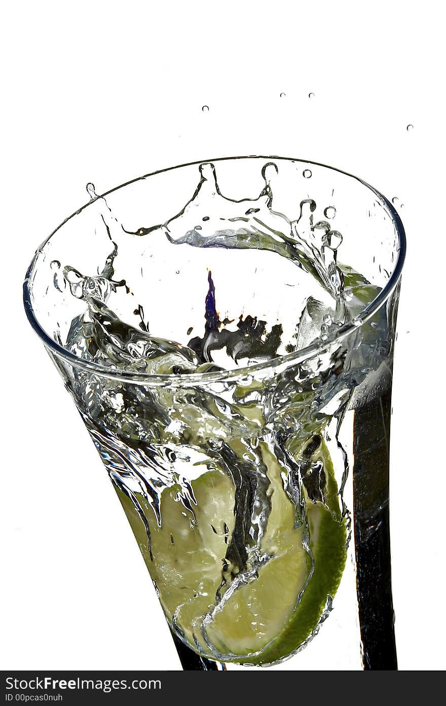 Glass with water and lemon on the white background