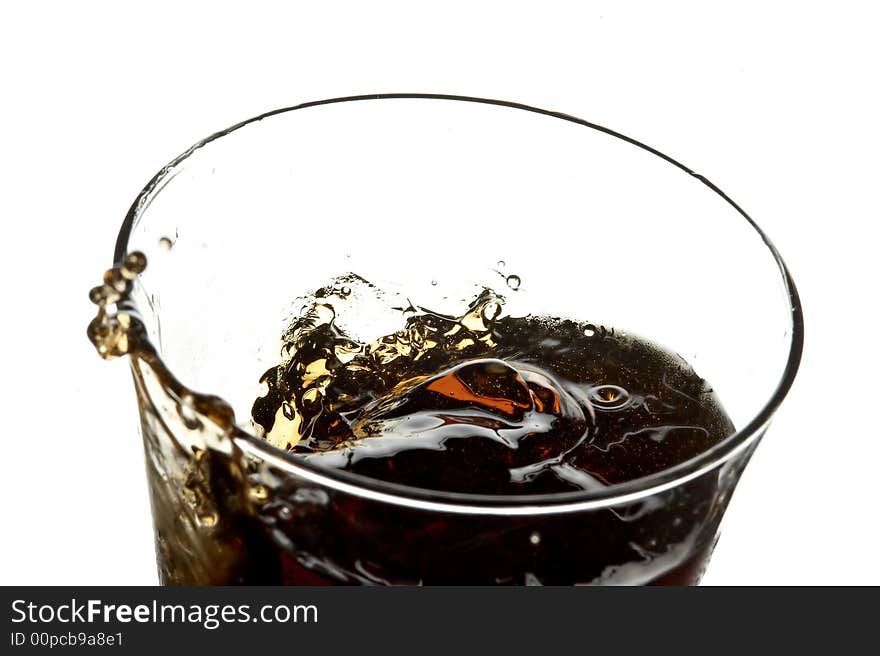 Glass with cola on the white background