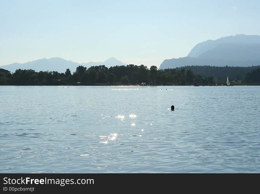 Swimming at the lake faakersee in Carinthia / Austria. Swimming at the lake faakersee in Carinthia / Austria