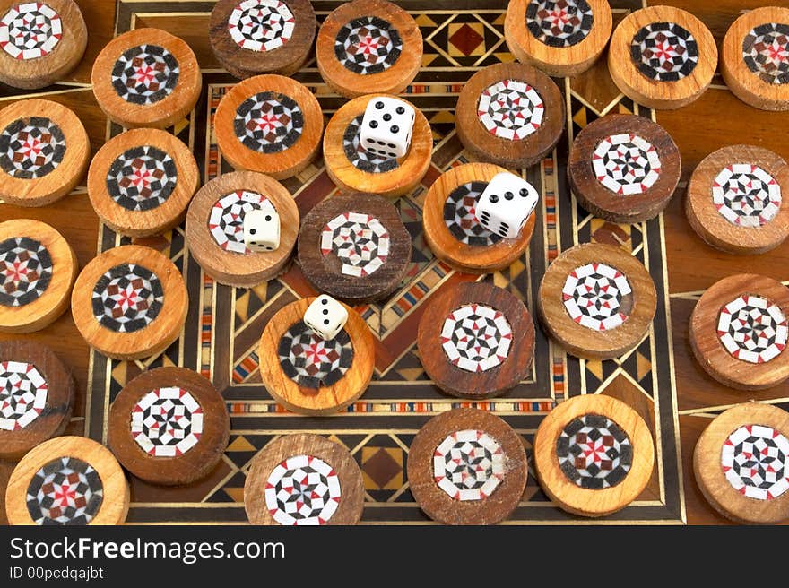 Handmade backgammon and playing dice.