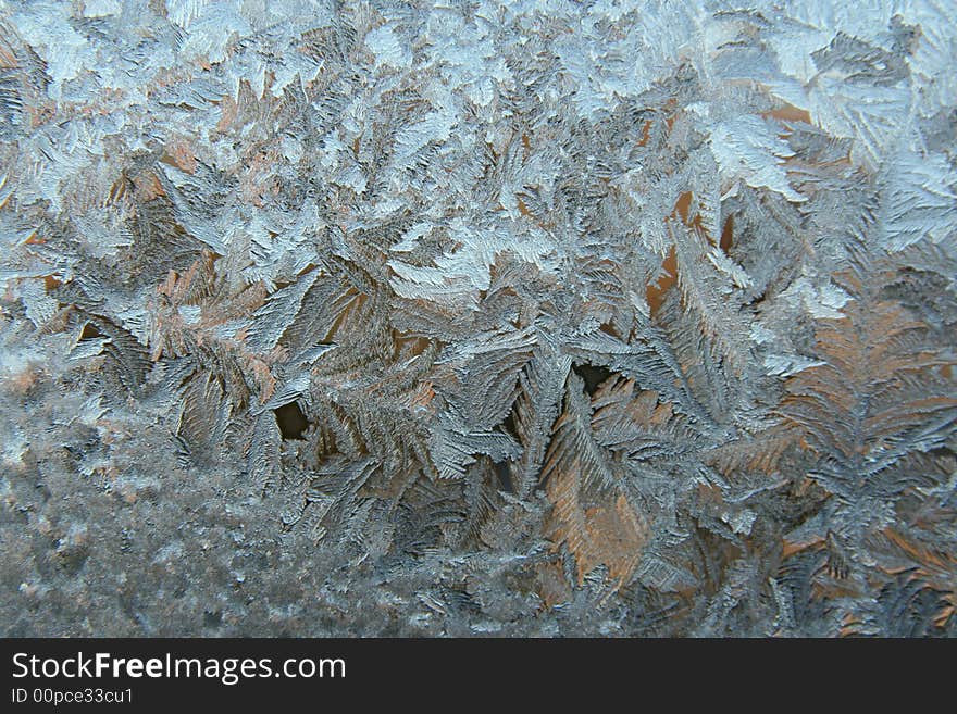 Ice patterns on frosty window. Ice patterns on frosty window.