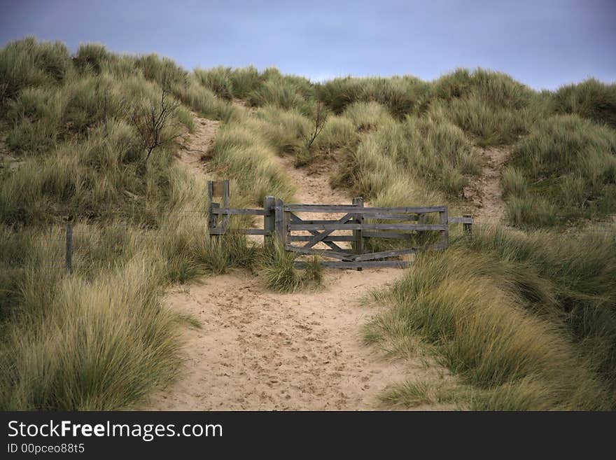 Beach path and sand dunes Bamburgh North East England