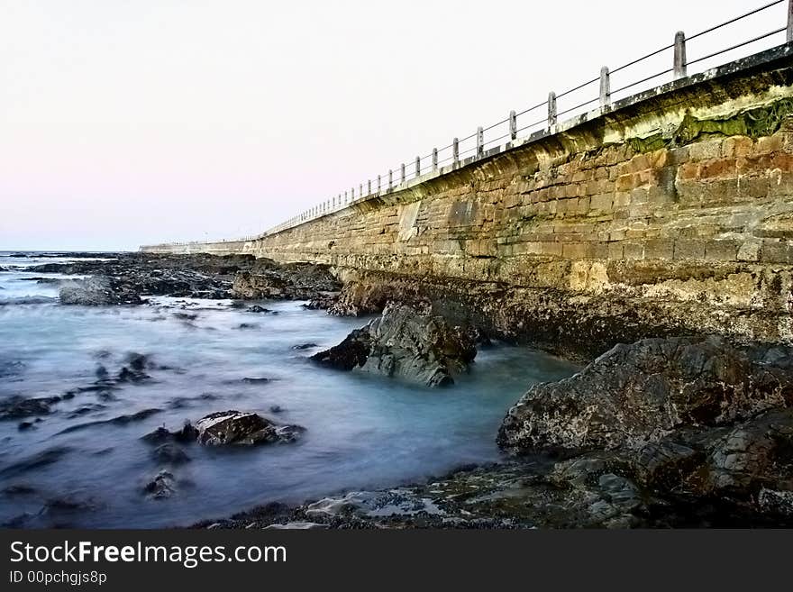 Landscape photo of an old sea-wall. Landscape photo of an old sea-wall