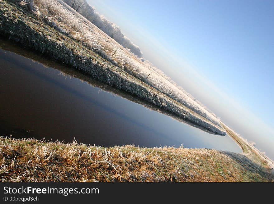 A river in the winter, somewhere in Holland. A river in the winter, somewhere in Holland.