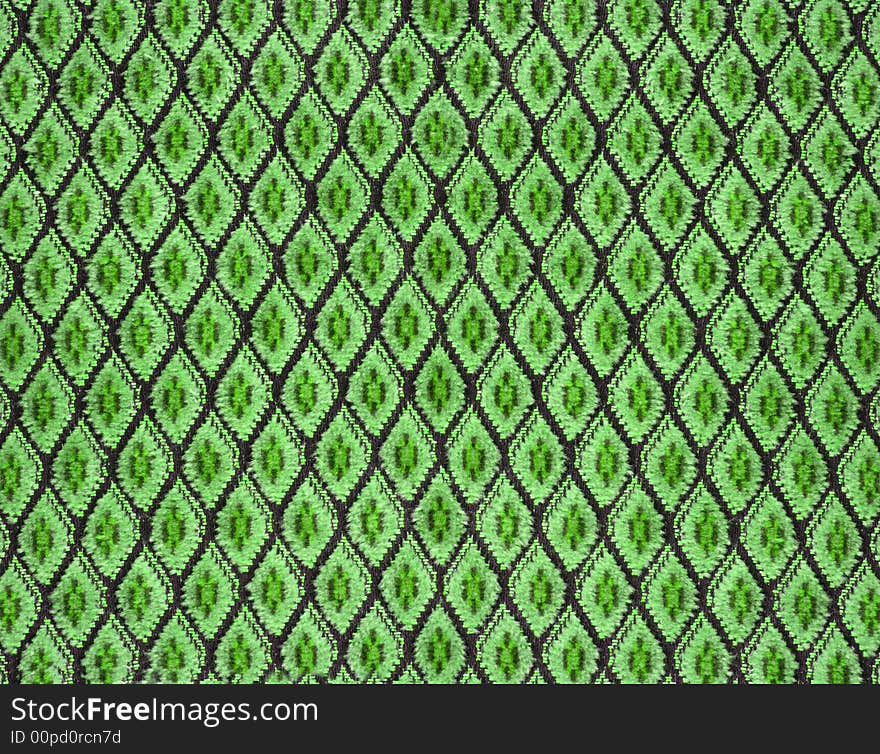 Green fabric material texture with rhombs. Green fabric material texture with rhombs