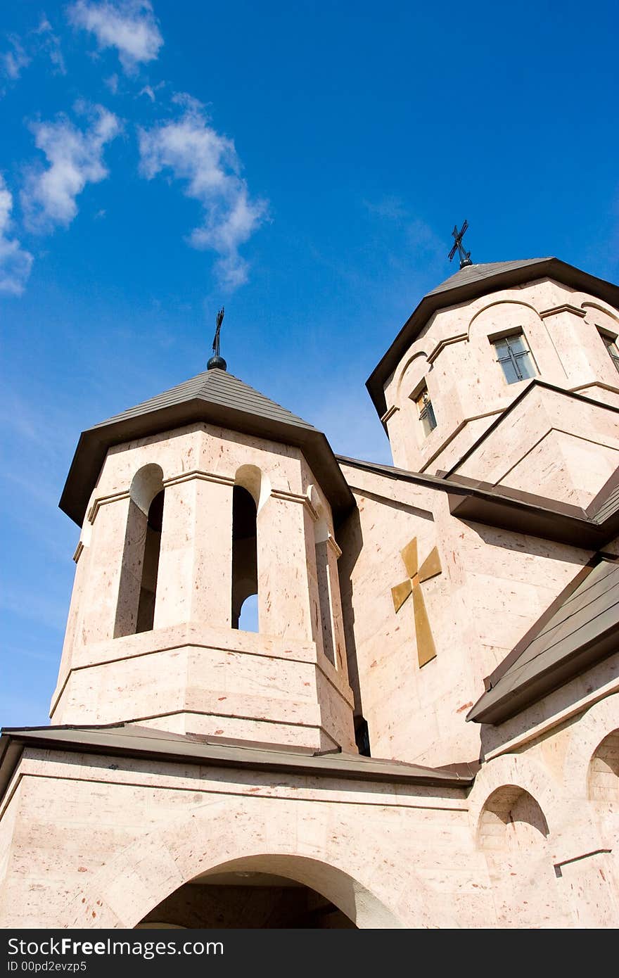 A catholic chirch and the blue clouded sky. A catholic chirch and the blue clouded sky