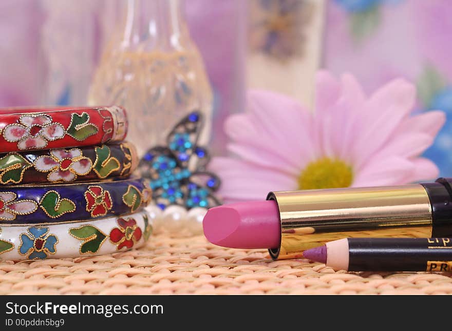 Vintage Bracelets with Lipstick, Lipliner and Flower, Shallow DOF. Vintage Bracelets with Lipstick, Lipliner and Flower, Shallow DOF