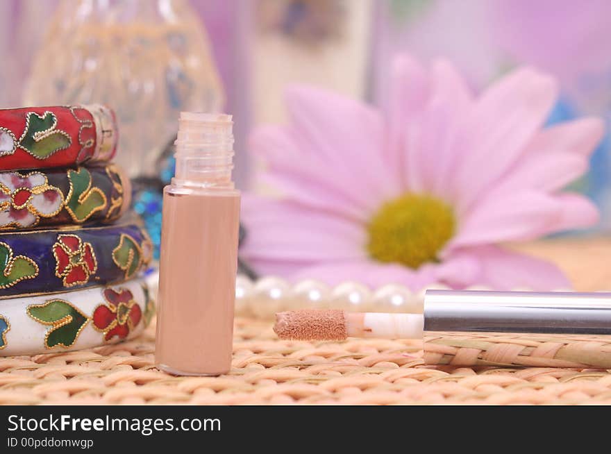 Vintage Bracelets with Cosmetics and Flower on Wicker, Shallow DOF. Vintage Bracelets with Cosmetics and Flower on Wicker, Shallow DOF