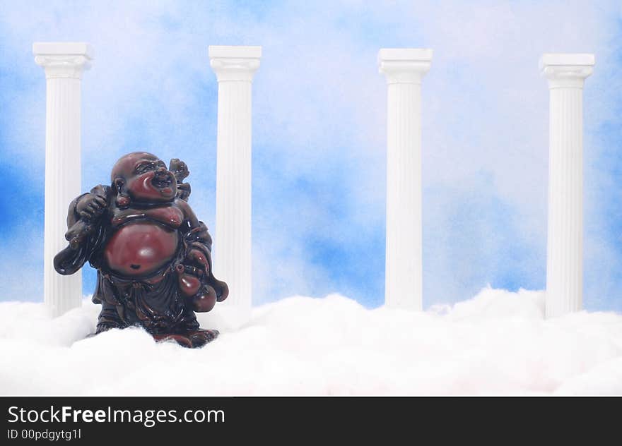 Buddha With Columns and Cotton on Blue and White Textured Background. Buddha With Columns and Cotton on Blue and White Textured Background