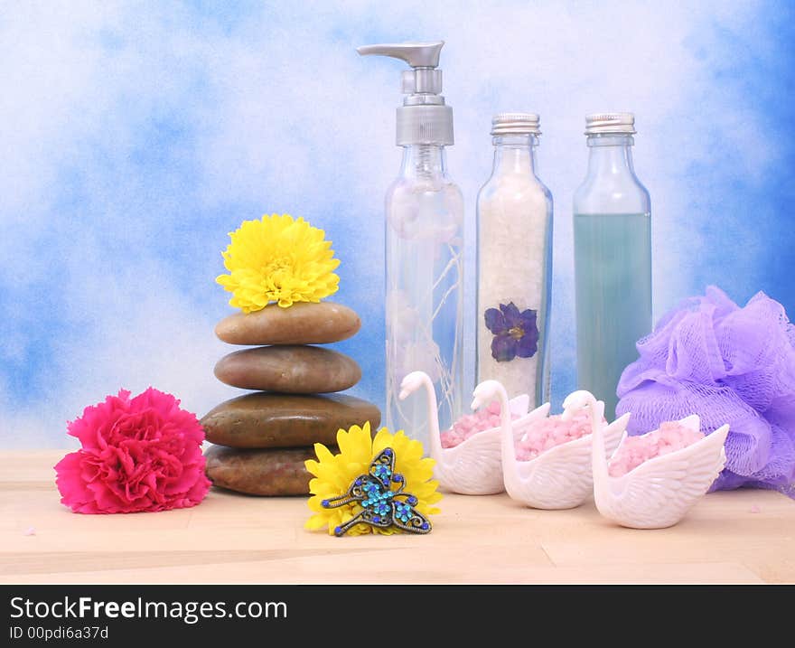 Bath Salts and Soap With Flower on Blue Textured Background. Bath Salts and Soap With Flower on Blue Textured Background