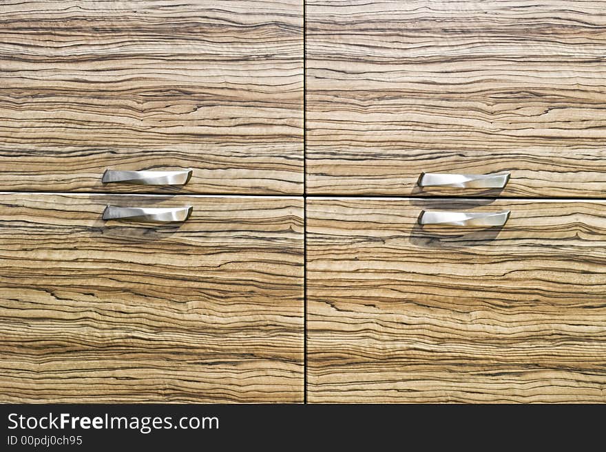 Wooden texture of closet with four drawers