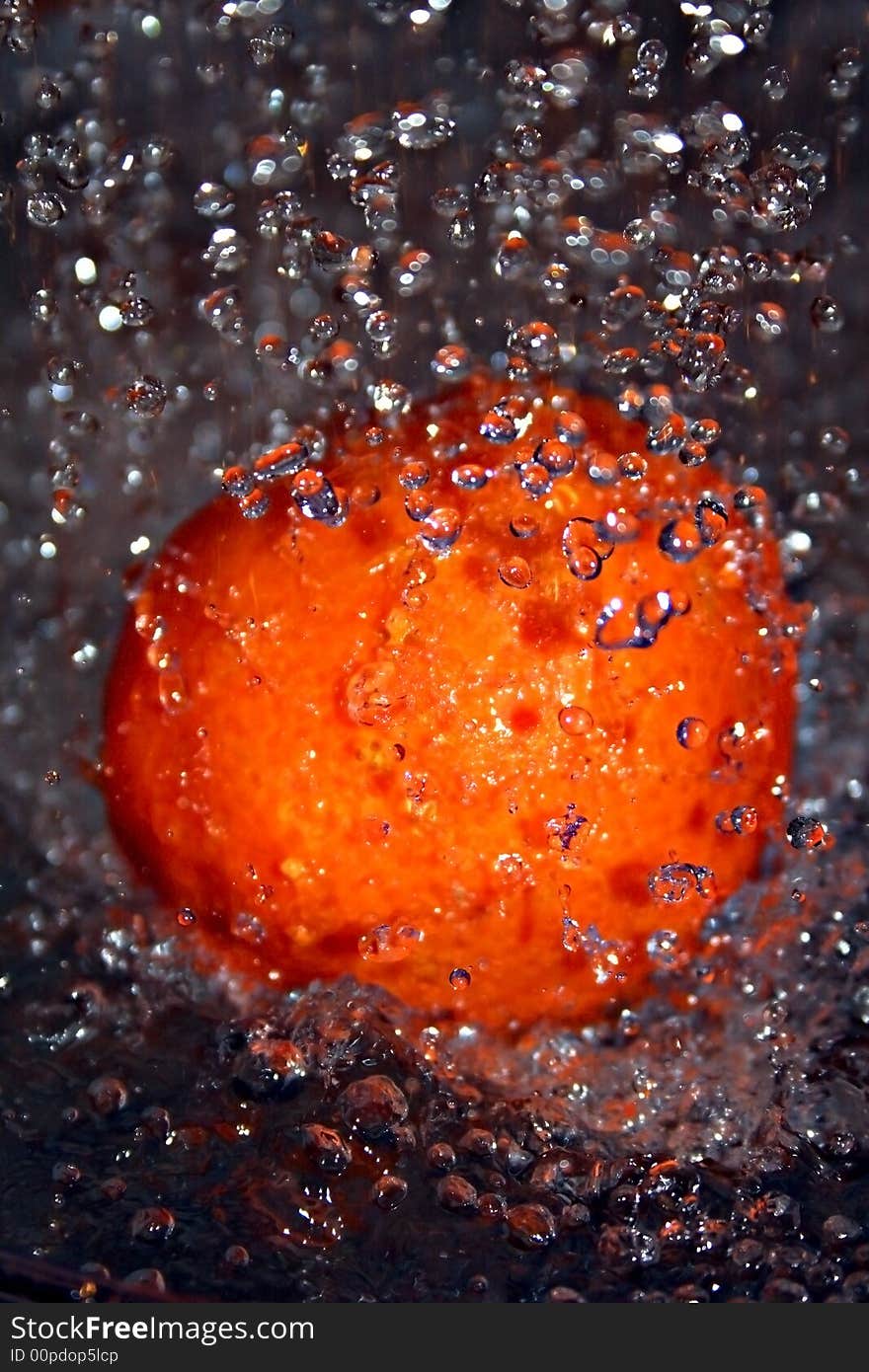 Fruit in water with drops. Fruit in water with drops