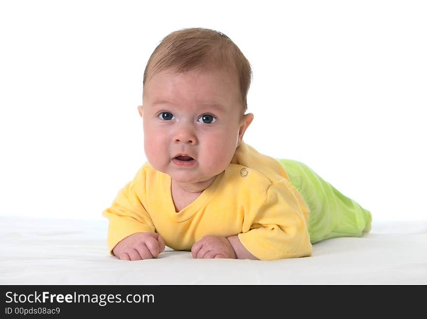 Baby on bed over white