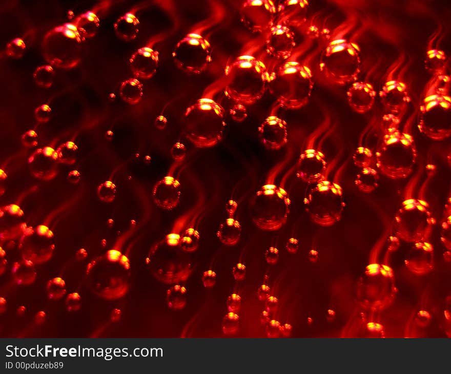 Effervescent bubbles in a red beverage. Effervescent bubbles in a red beverage.