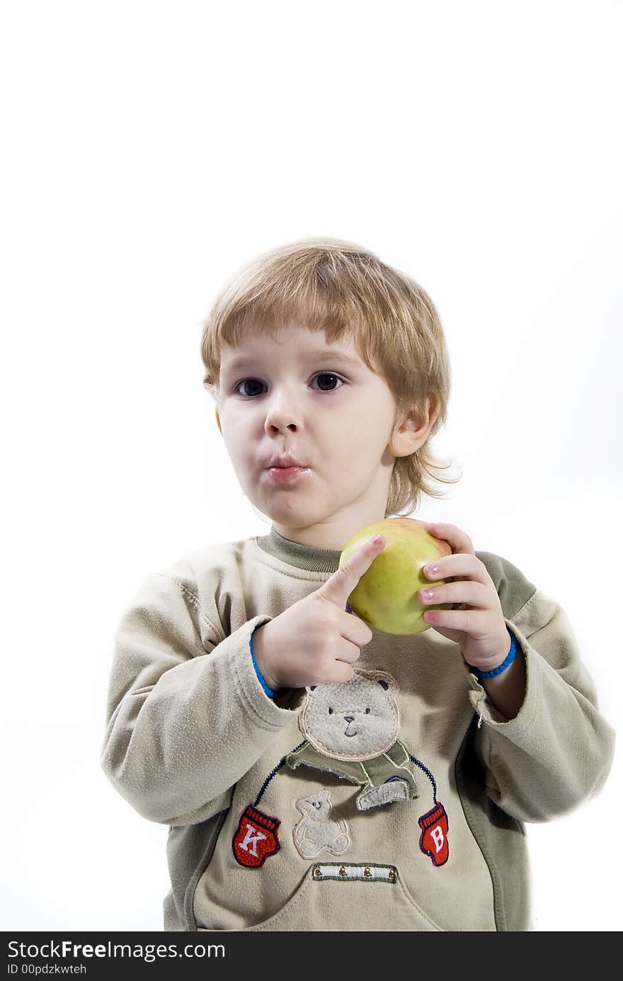 Young girl eating an apple. Young girl eating an apple