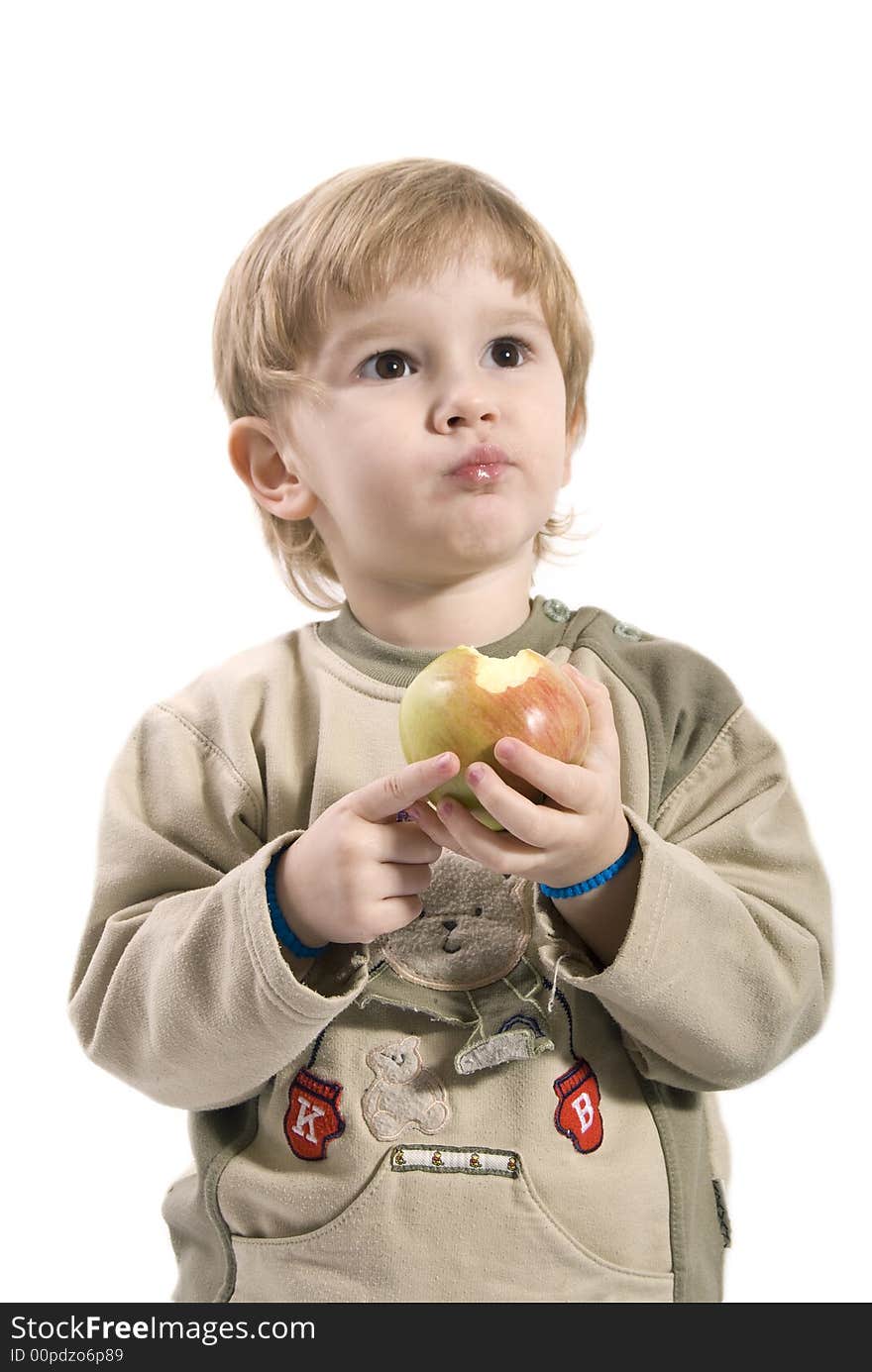 Young girl eating an apple. Young girl eating an apple