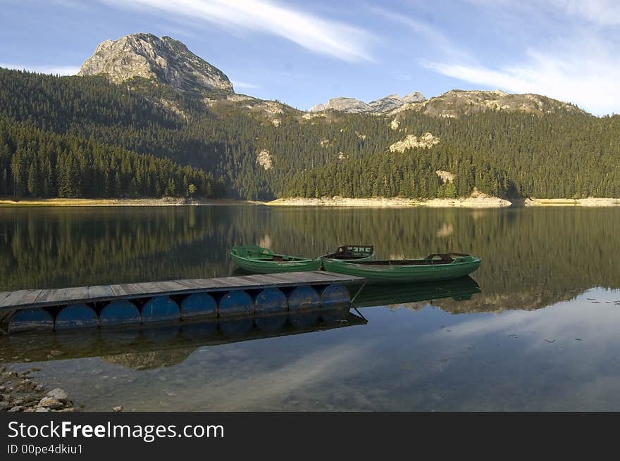 Three boats on the mountain lake