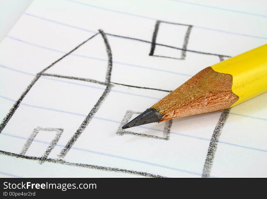 Pencil over a drawing of a house. Pencil over a drawing of a house