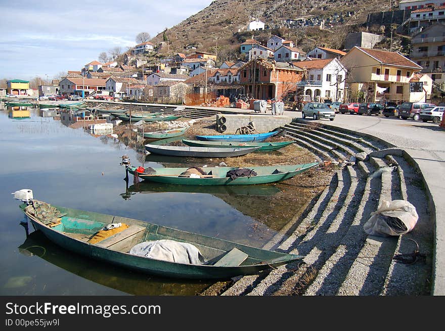 Little village with boats on the lake