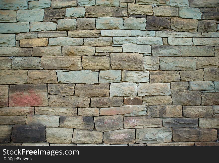 Wall texture of old farm wall made of local stones