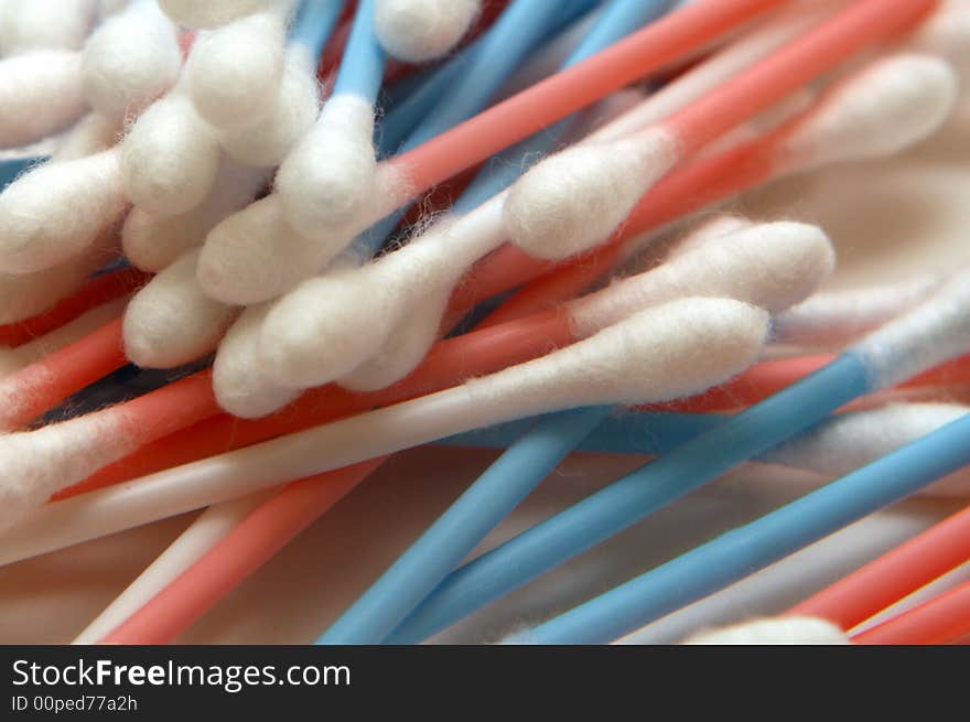 Blue, pink and white cotton buds