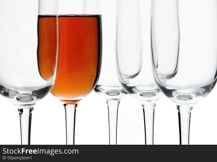 Glasses in studio on a white background, placed in a row